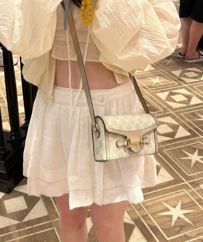 Gucci Horsebit 1955 Mini Crossbody Bag in GG Supreme Canvas and Leather Trim