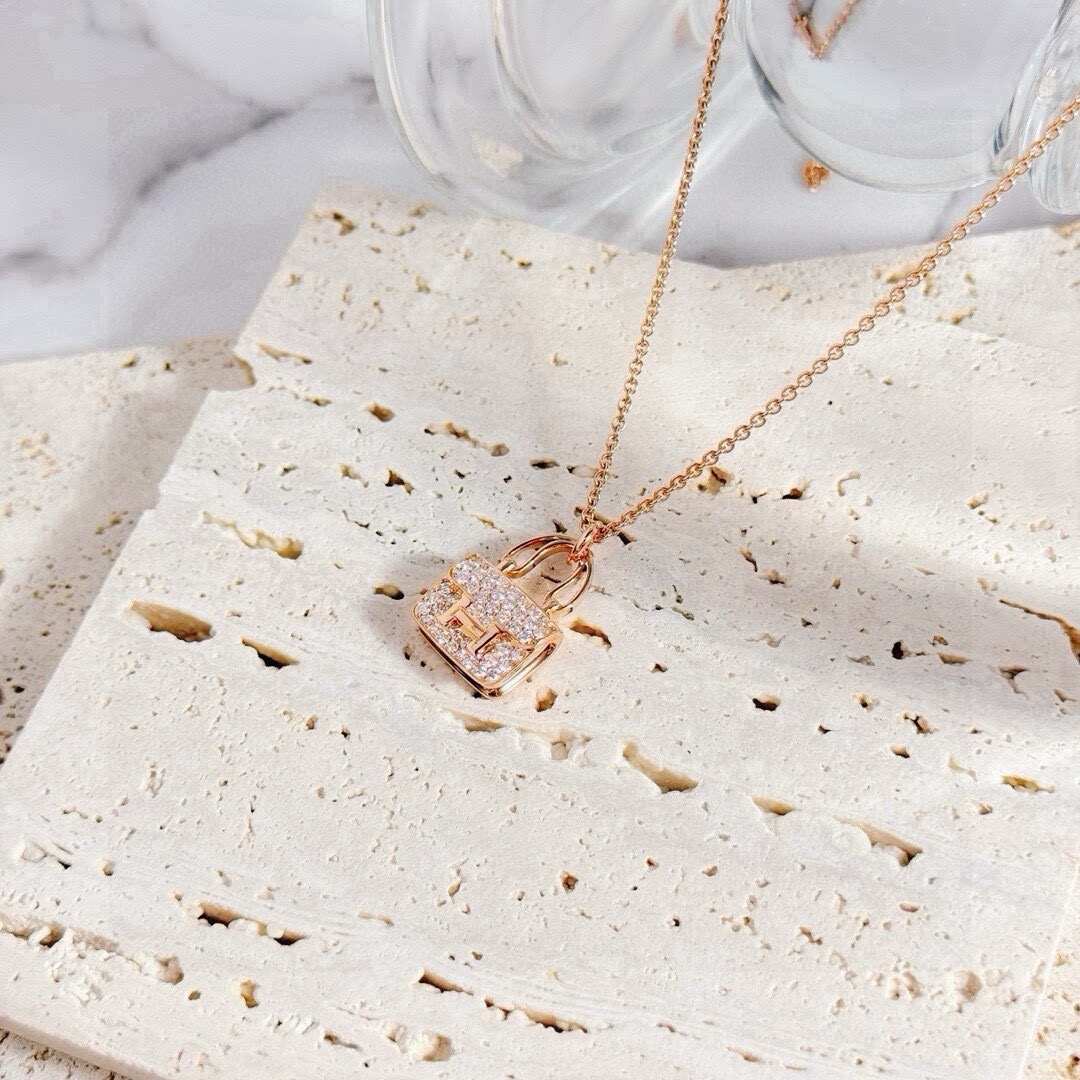 Hermès Amulette Constance Pendant Necklace, 18K Rose Gold Full Pave Diamond Setting