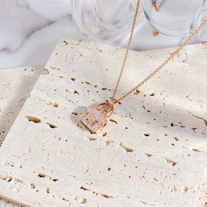 Hermès Amulette Constance Pendant Necklace, 18K Rose Gold Full Pave Diamond Setting