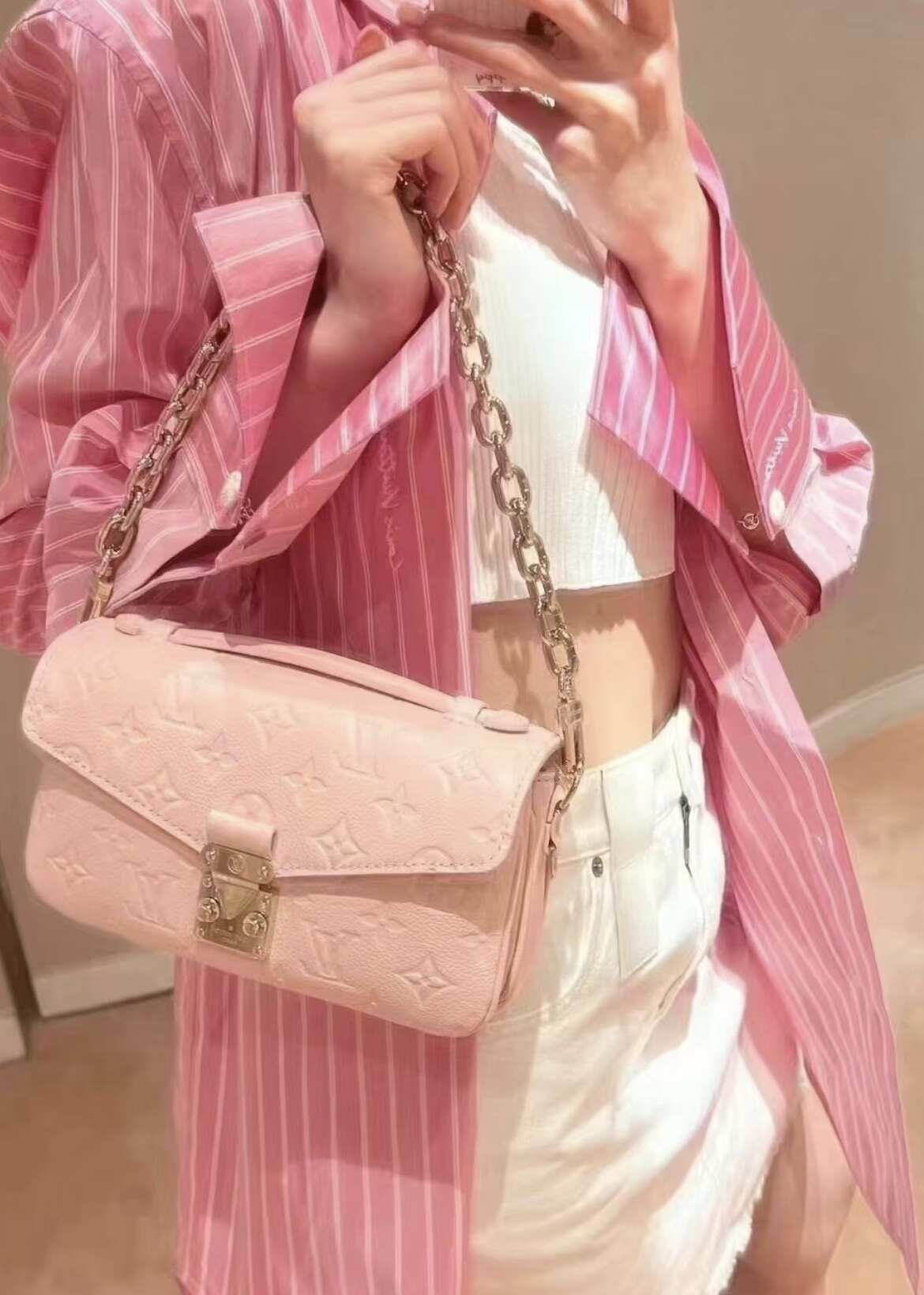 Louis Vuitton Pochette Métis East West in Pink Monogram Empreinte Leather