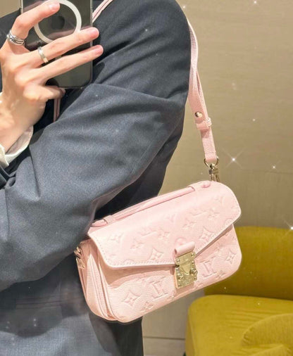 Louis Vuitton Pochette Métis East West in Pink Monogram Empreinte Leather