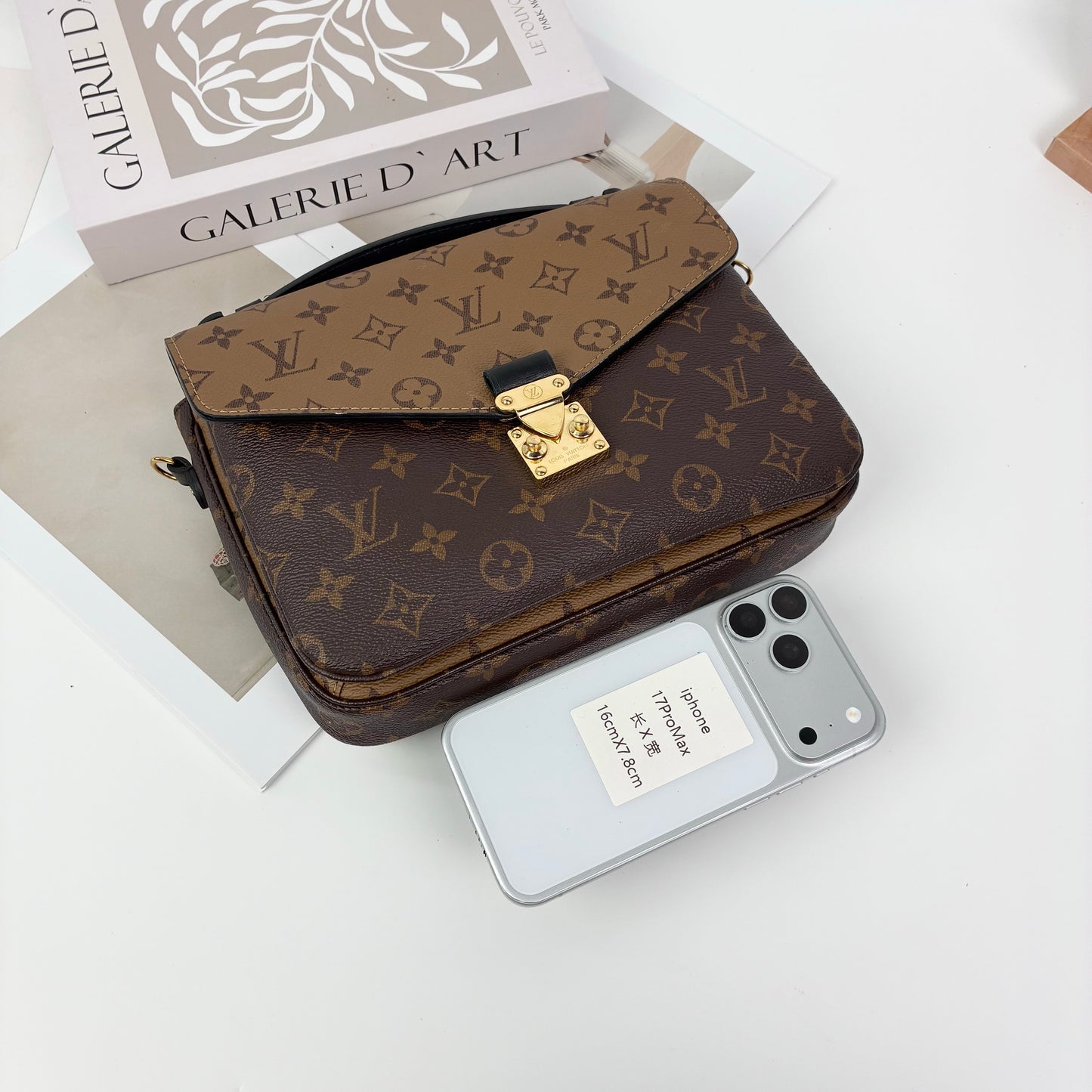 Louis Vuitton Pochette Métis, Reverse Monogram Canvas, Gold-tone S-Lock Hardware