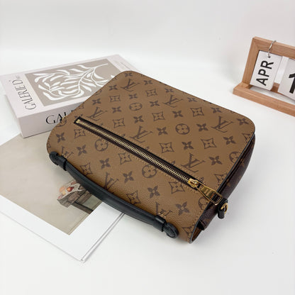 Louis Vuitton Pochette Métis, Reverse Monogram Canvas, Gold-tone S-Lock Hardware